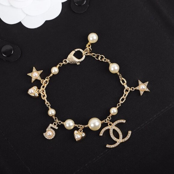 Auth Chanel Light Gold Hardware CCS Gold Pearl and Crystal Charm Bracelet 24C - Picture 1 of 8
